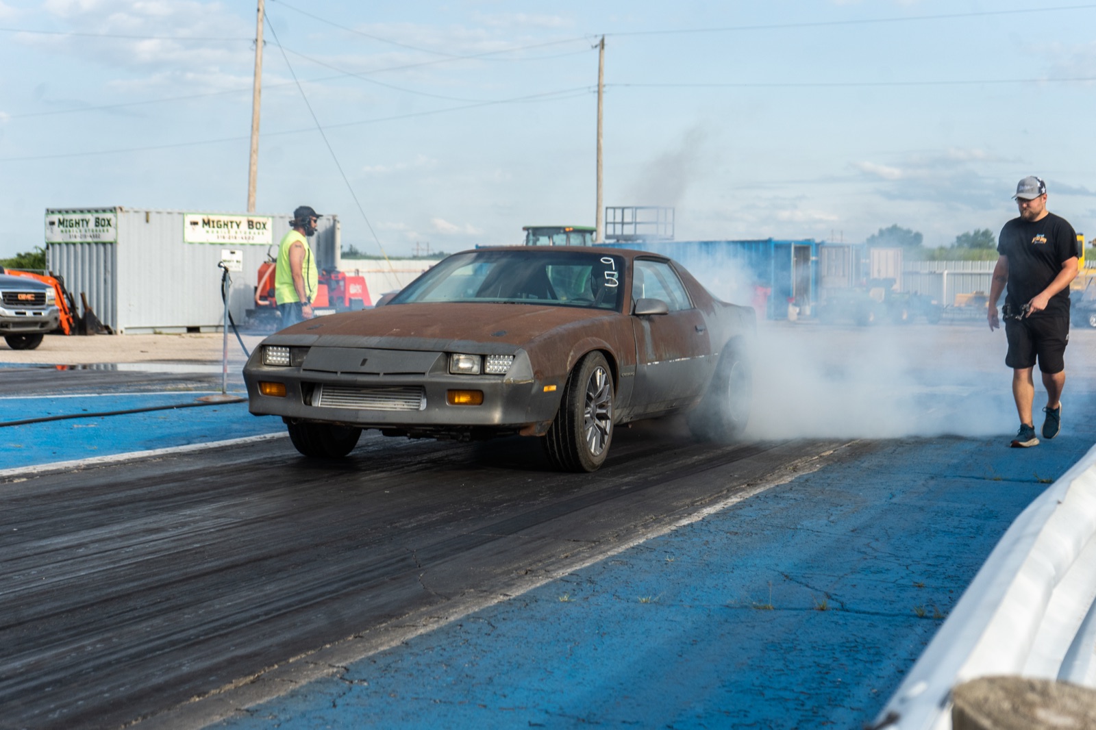 Konza Labs' '85 Camaro doing a burnout at the drag strip